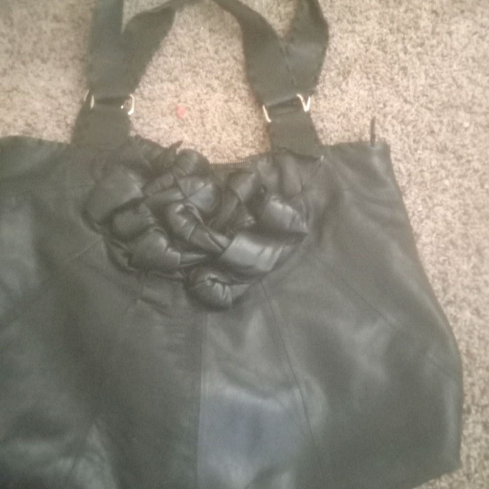 A black leather purse